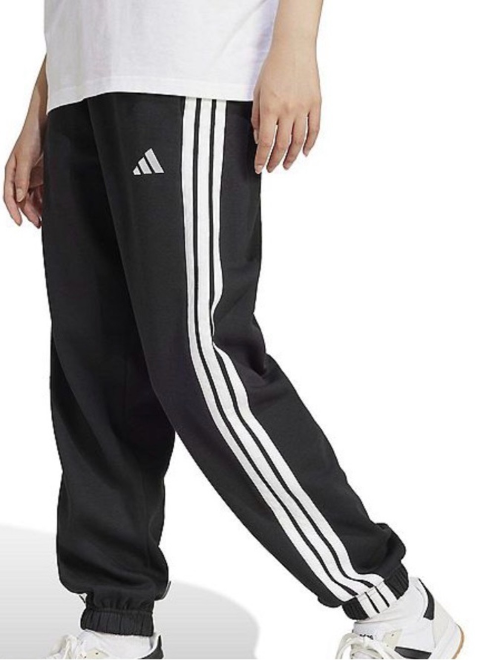 Women’s small black Adidas fleece pants.
